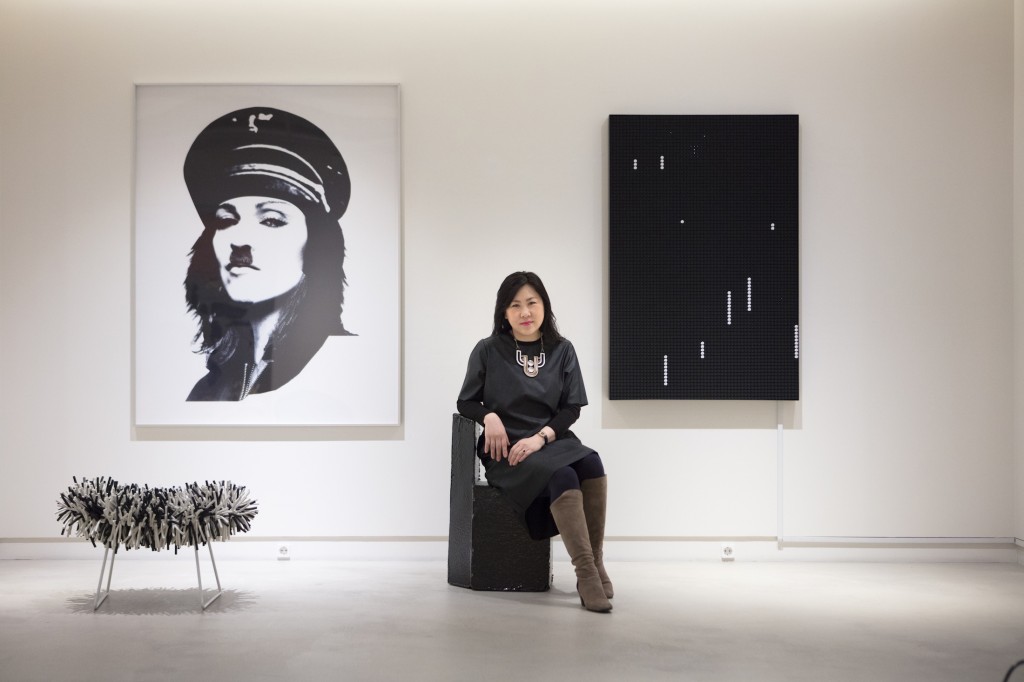Christina Heekyung Kang in front of pieces from her collection. Photo: Jinkyun Ahn. Courtesy of Christina H. Kang.