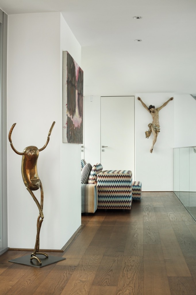 Two sculptures by Erwin Wurm alongside with painting by Herbert Brandl. Photo: Andrew Pharaoh. Courtesy of AnderlWeber Collection