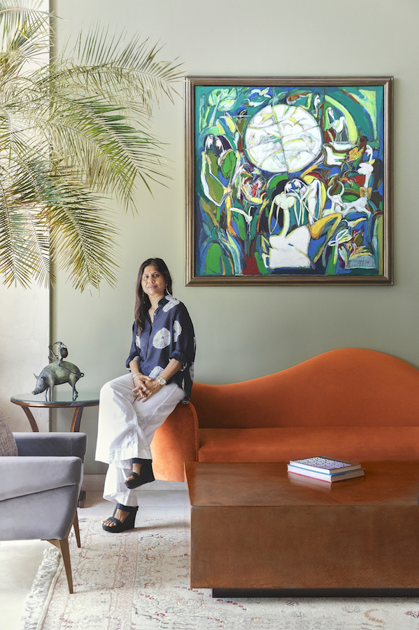 Swati Jajodia in her home in Mumbai beside a Dhiraj Choudhury. Photo: Talib Chitalwala. Courtesy of Swati Jajodia.