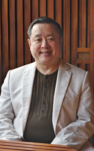 Portrait of Leo Shih in his private gallery. Photo by Ann Woo for ArtAsiaPacific. Courtesy ArtAsiaPacific. 