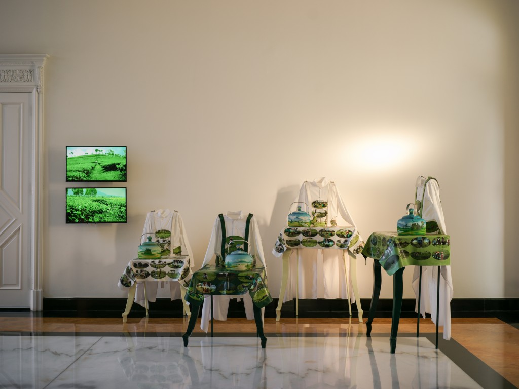 Mella Jaarsma, "A Blinkered View – High Tea Low Tea", 2013, print on leather, textile, kettle, tea, wood and iron construction, two-channel video. Courtesy of the collector.