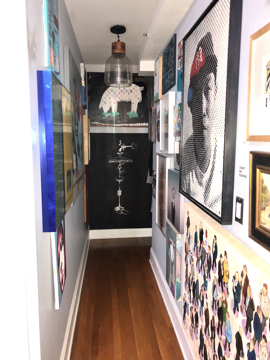 An art-filled corridor in this artist-collector's New York apartment. Courtesy of Guy Stanley Philoche.