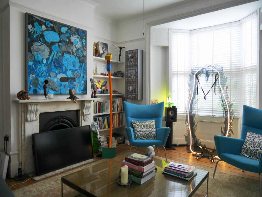 From left to right: painting by Russell Tyler, bronze sculpture by Laura Ford, wall cabinet by Alex Mackin Dolan, figurines by Kaws, neon sculpture by Isaac Lythgoe. Courtesy of Victor Benady.