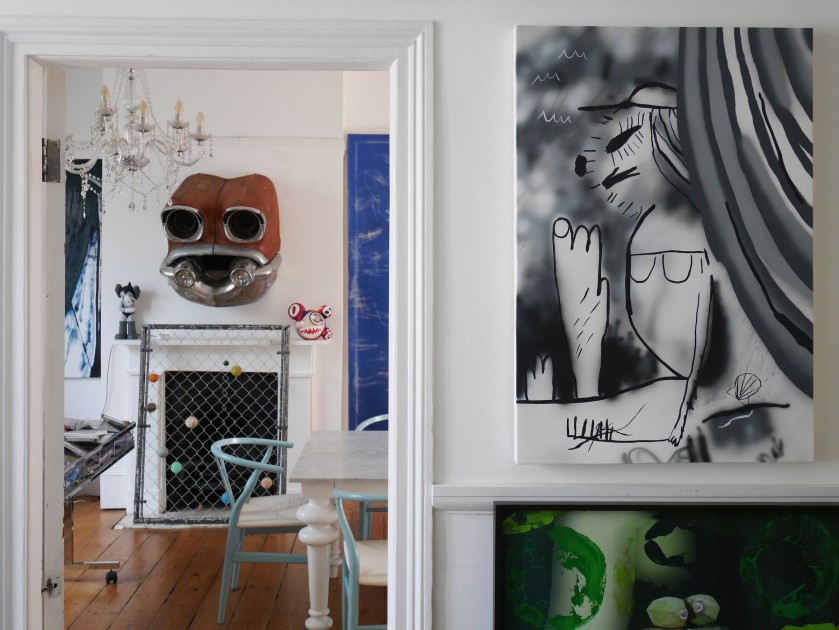 Left to right: painting by Max Ruf, sculpture by Cory Arcangel, figurine by Kaws, wall sculpture by Leo Fitzmaurice, metal fence by Evan Robarts, figurine by Takashi Murakami, painting by Rannva Kunoy, painting by Joshua Nathanson, panted digital print by Sam Falls. Courtesy of Victor Benady.