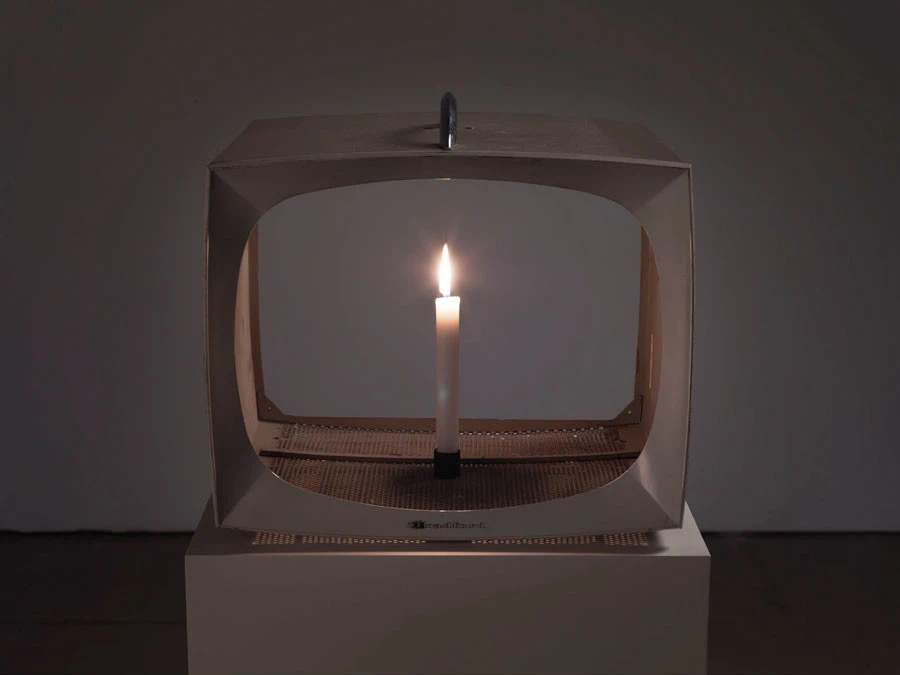Nam June Paik, "Candle TV", marker on old TV case, built-in lighted candle, 38.1x41.6x37.8cm, 1991. Collection of START Museum