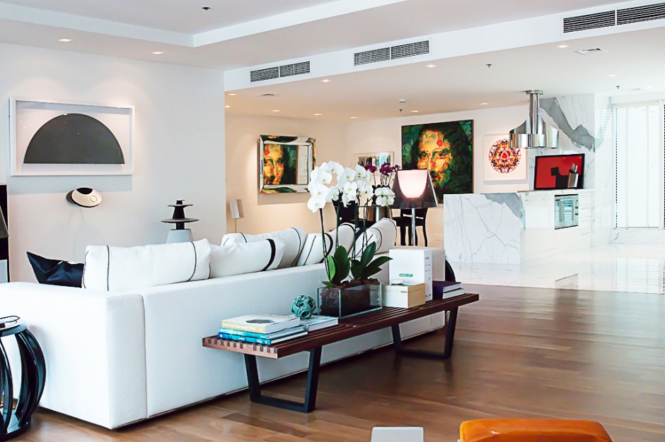 Home interior with artworks by Ayesha Sultan, Damien Hirst, Jaber Al Azmeh, Nelson Wilbert and Patrick Hughes. Photo: Jacqueline Sofia. Courtesy of Shohidul Ahad-Choudhury.