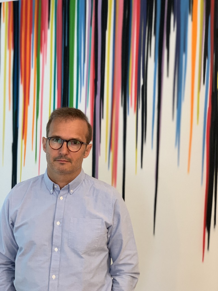 Patrick Lerouge in front of 'Ghost Town Skyscrapers', 2014. Courtesy of Patrick Lerouge.