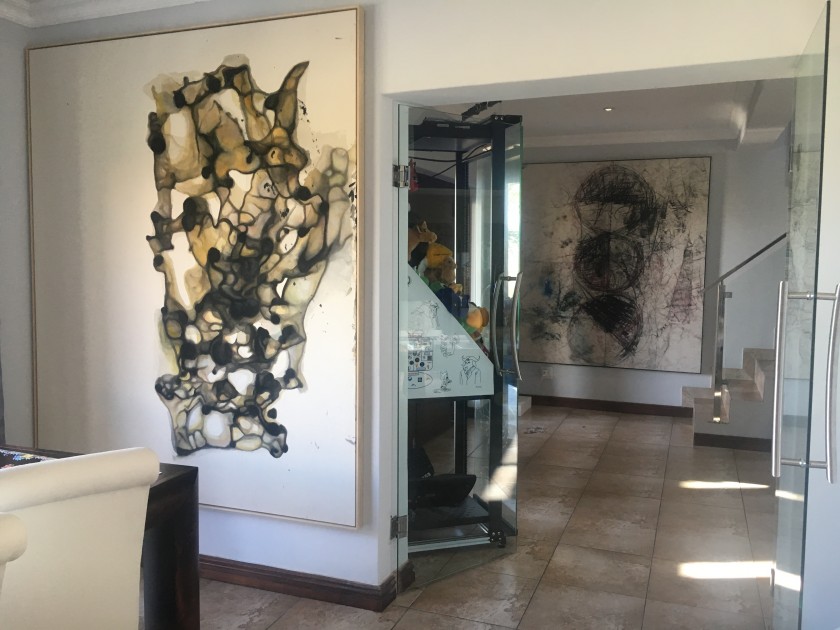 Home interior with artworks by Sergej Jensen, Oscar Murillo and Simon Denny. Courtesy of Louis Kotze.