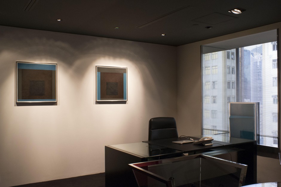 Josef Albers, "Homage to the Square [Memorial A and Memorial B]", 1962 (pair on the wall) and Wolfgang Tillmans, Lighter IX, 2007 (by the window). Courtesy of Kazunari Shirai.