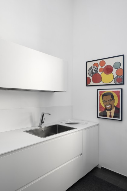 Francesco Taurisano’s apartment. In the kitchen, works by Alexander Calder, Emory Douglas and Joana Escoval. Naples, Italy. Courtesy of CollezioneTaurisano. Photo: Maurizio Esposito.