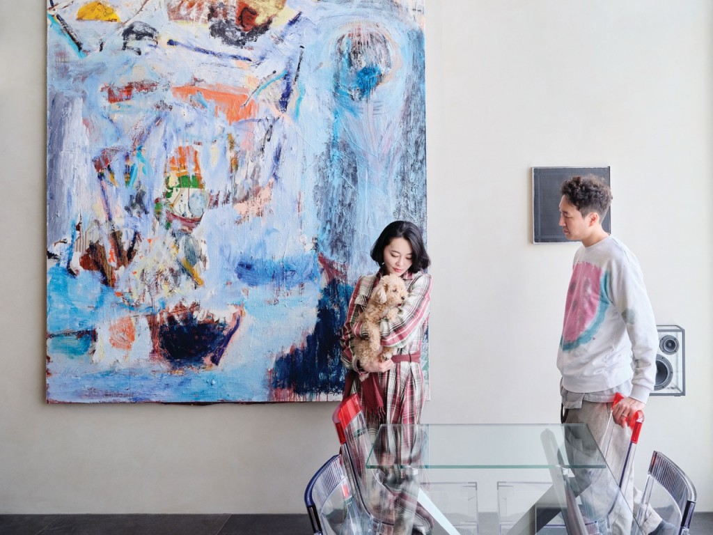 Soyoung Lee and her husband in their art-filled duplex apartment. 