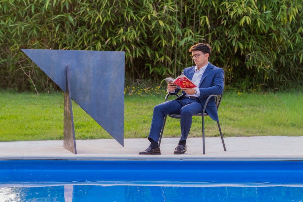 Giuseppe with a sculpture by Michaela Meise. Courtesy of Giuseppe Simone Modeo