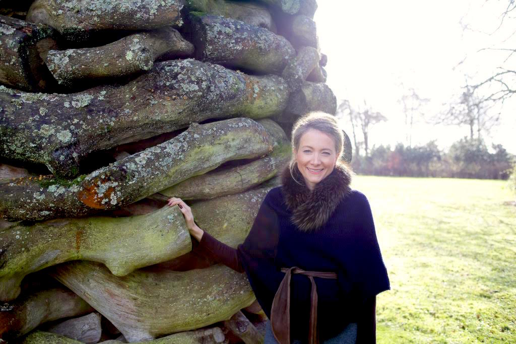 Miel by Goldsworthy’s cairn in the grounds of her country home. Courtesy of Miel de Botton.