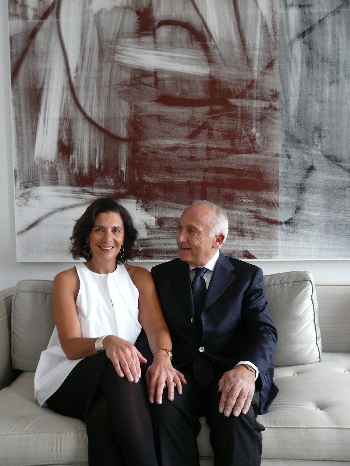 Muriel and Freddy Salem in front of work (partial) by Christopher Wool. Courtesy of the Cranford Collection.