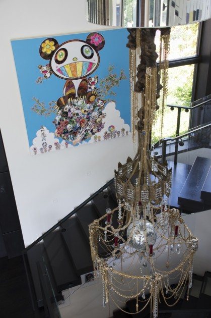 The art-decorated staircase with Takashi Murakami and DZINE (Carlos Rolon). Photo: Emily Hoerdemann. Courtesy of Amy Phelan.