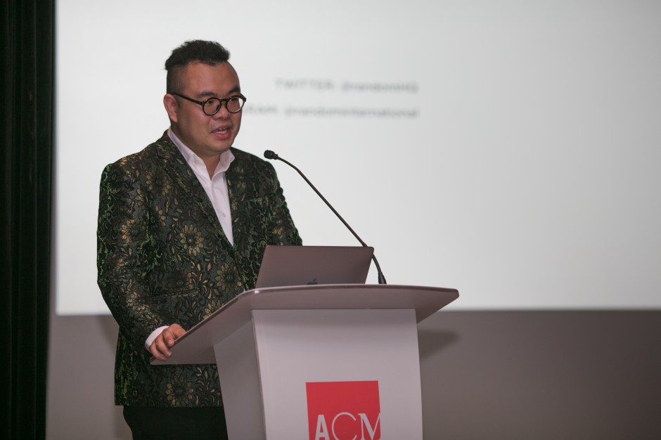 Ryan Su delivering the Opening Address at a talk hosted by The Ryan Foundation — The Dark Side of the Swarm lecture by Hannes Koch, co-founder of Random International (2017). Asian Civilisations Museum, Singapore. Courtesy of The Ryan Foundation.