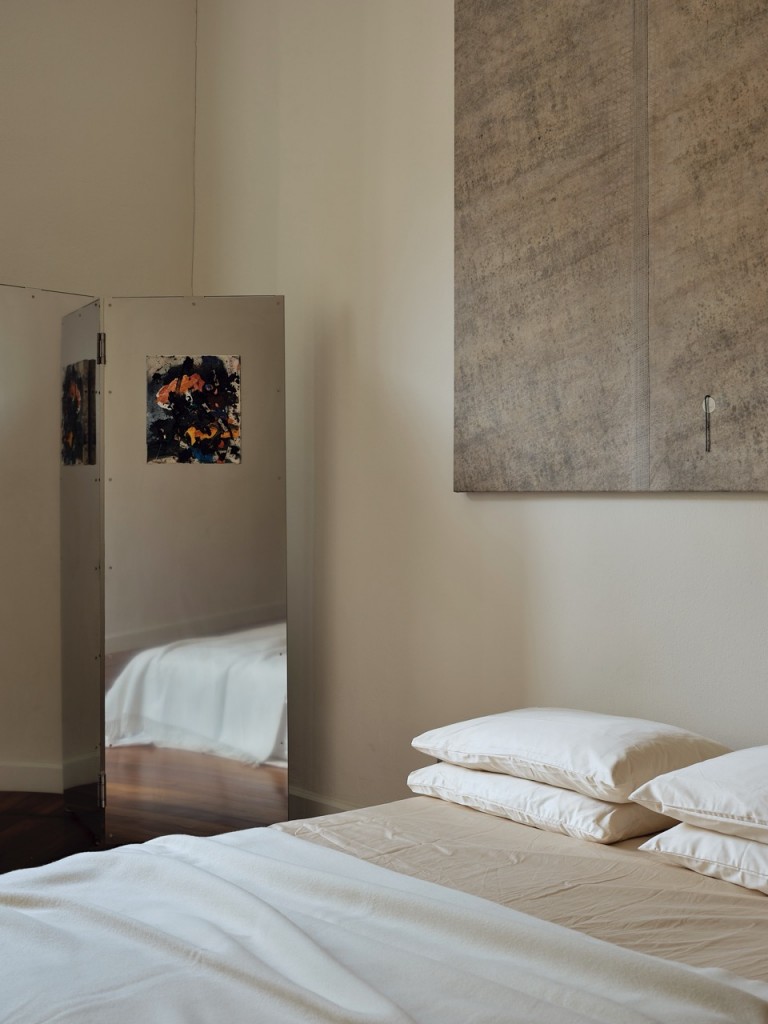 A painting by Tim Garwood lives in the bedroom