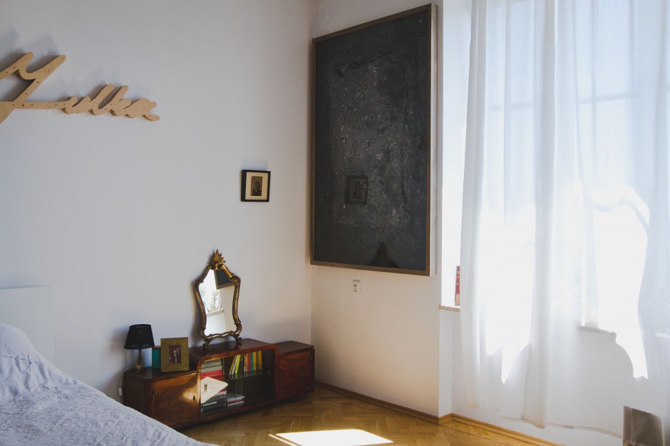 Bedroom interior with artworks: (from the left) Michal Gayer, Krwawa Julka (broken neon), 2009 and Witek Orski, Earthhole #2, 2015. Courtesy of Borowik Collection.