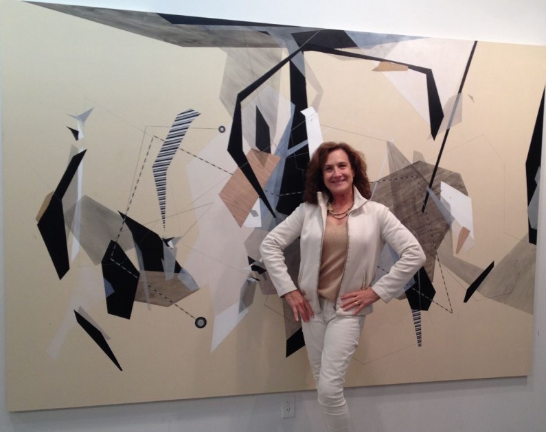 Jane Wesman with Danielle Tegeder painting in artist's studio
