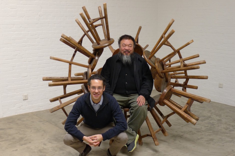 Christopher Tsai and Ai Weiwei in front of Grapes, stool sculpture by the artist. Courtesy of Christopher Tsai.