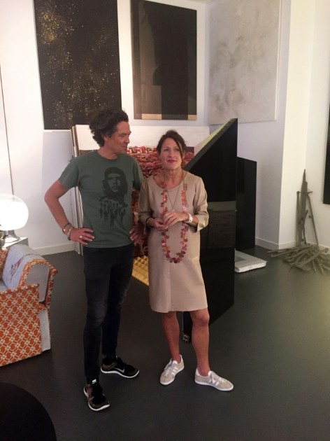 Henk Drosterij and his wife Karen Knispel in front of artworks by Sarah van Sonsbeeck, Martijn Hendriks, Phoebe Unwin. Courtesy of Henk Drosterij.